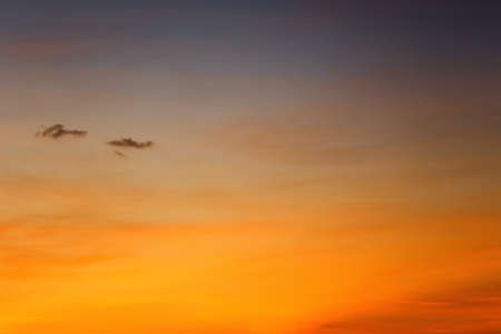 Sky and clouds after sunset,twilight sky view for natural landscape design,Orange tone of photos.の写真素材
