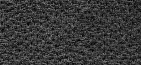 Black paper wrinkled texture background for design in your work.
