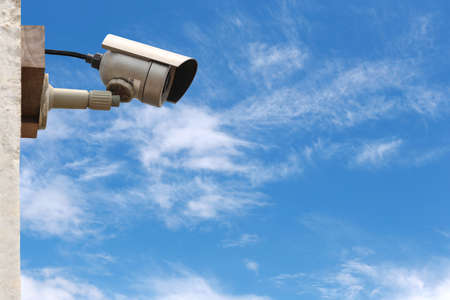 CCTV camera system on blue sky background with copy space.