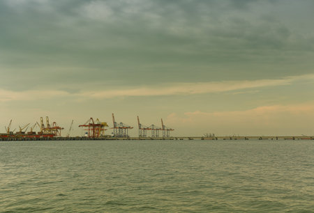 View of a working deep sea port in vintage colors, Loading and unloading of cargo ships.の写真素材