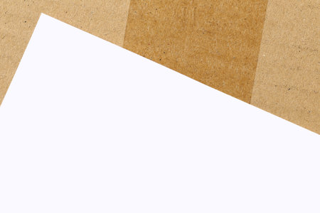 Background of blank white paper on brown cardboard and have copy space can be used to design your work.の写真素材