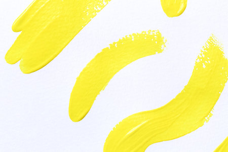 Yellow brush isolated on white art background, yellow watercolor user paintbrush with hand draw.の写真素材