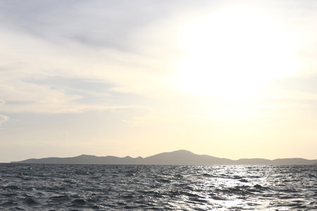 View of the tropical coast with islands in front in the evening.の写真素材