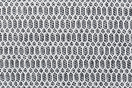 Filter sheet has features a detailed honeycomb pattern in White and black, showcasing a modern and stylish design. Perfect for backgrounds and textiles.の写真素材
