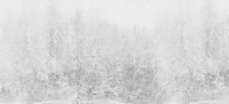 A soft gray abstract background featuring a subtle textured layer, ideal for various design projects, print media, and digital art applications. Perfect for creating a calming atmosphere.の写真素材