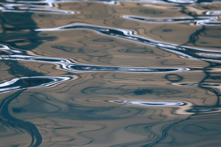 Surface of the water in the pool,Bright blue water background.の写真素材