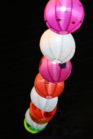 Handmade paper lanterns at the Lantern Festival At night in Khon Kaen Province, Thailand.