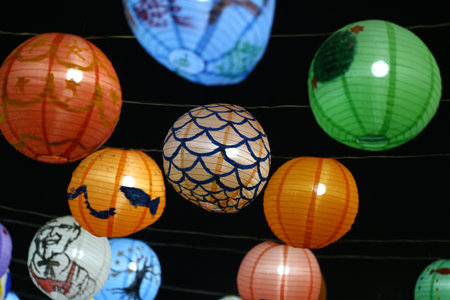 Handmade paper lanterns at the Lantern Festival At night in Khon Kaen Province, Thailand.の写真素材