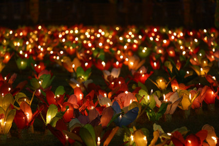 Candles are lit in colorful lanterns at the Loi Krathong festival in Khon Kaen province, Thailand.の写真素材