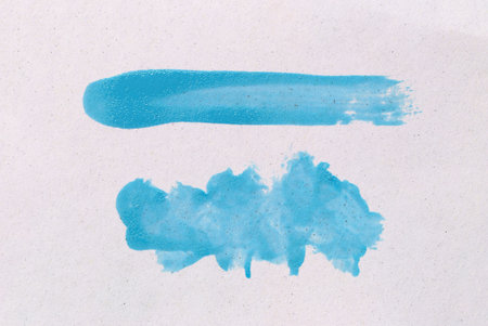 Light blue brush isolated on white art paper background. blue watercolor user paintbrush with hand draw.の写真素材