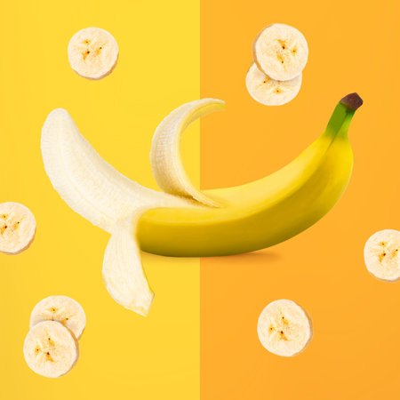 Ripe banana with banana slices isolated on yellow and orange backgroundの写真素材