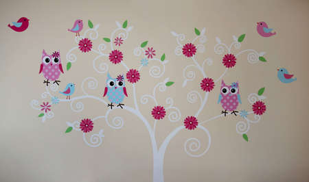 Owls and birds on the tree wall paintingの写真素材