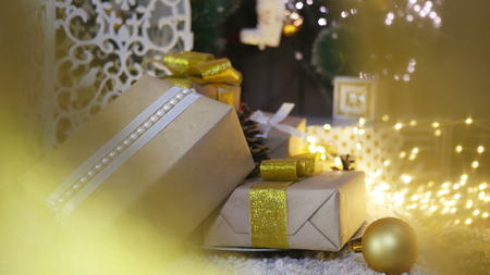 Presents under the Christmas tree on floorの写真素材