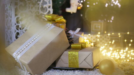 Presents under the Christmas tree on floorの写真素材