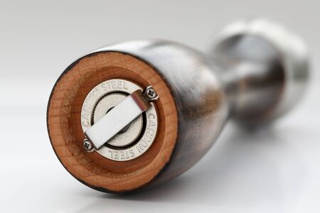 Nice smooth wooden pepper grinder with steel rotor closeup