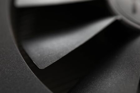 Blades of black industrial fan from air conditioning system close-upの写真素材