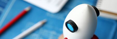 Close-up of miniature rocket standing on table. Macro shot of rocketship as symbol for business project and start-up. Selective focus. Success and growth conceptの写真素材
