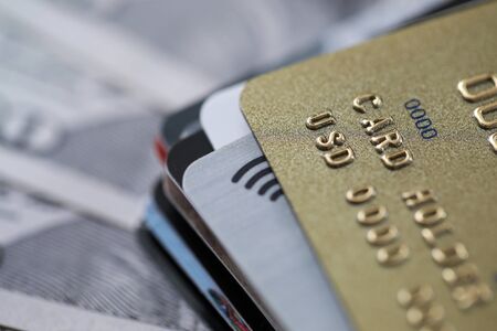 Variety banking products for credit card holder. Credit card with grace period. Payment for goods and services via Internet. Using contactless technology on credit card. Cash withdrawalsの写真素材