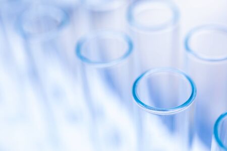 Closeup glass test tubes, chemical equipment. Specialized vessel cylindrical shape. Instrument used...