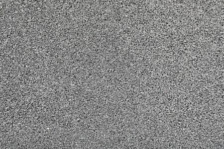 Grey colored artificial rubber flooring for gym or recreation ground close-up