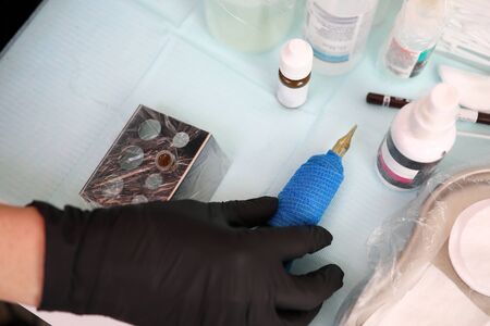 Cosmetologists table are permanent makeup products. Saving time on morning make-up. Desired shape and volume eyebrows. Eyebrow tattooing is performed using permanent makeup. Indelible makeupの写真素材