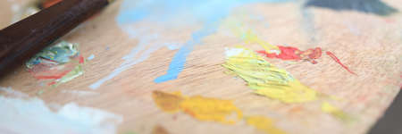 Close-up of palette with different bright colours. Macro shot of oil paints. Artist equipment for work. Spare time for hobby. Art and creative person conceptの写真素材