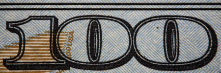 Detail of one hundred dollar denomination close-up. Accumulation or withdrawal of cash. Currency...