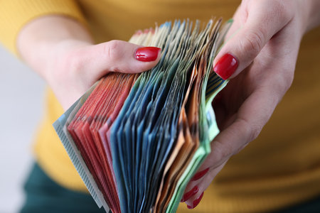 In womens hands euro banknotes of different denominations. Small and medium business development...