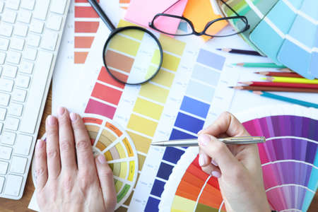 Designer develops color combinations on desktop. Color solutions in the interior conceptの写真素材