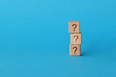 On blue background, there is pyramid of cubes with question mark