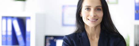 Portrait of smiling businesswoman in her officeの写真素材