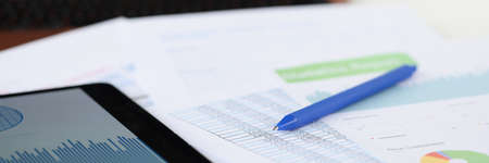 On table lies commercial graphics tablet and penの写真素材