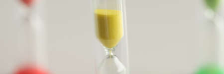Hourglass yellow, red and green. Deadline and time managementの写真素材