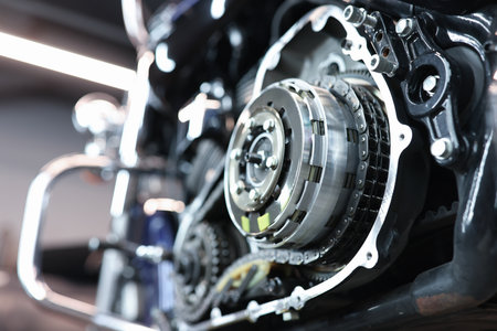 Sports motorcycle engine in service center closeup