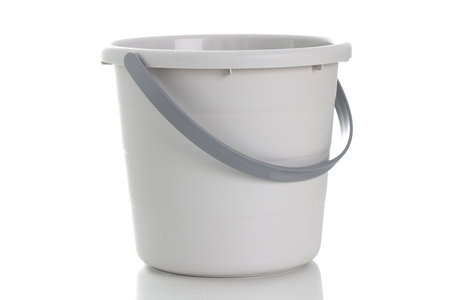 Light gray bucket with handle on white backgroundの写真素材
