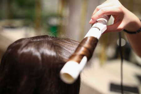 Pretty brunette client with long hairの写真素材