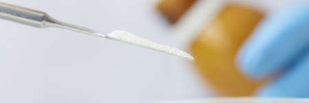 Research of white friable powder in laboratoryの写真素材