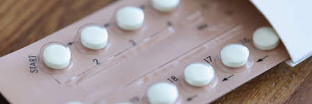 Women contraceptive hormonal birth control pills closeupの写真素材