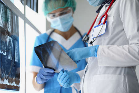 Protective face mask on worker