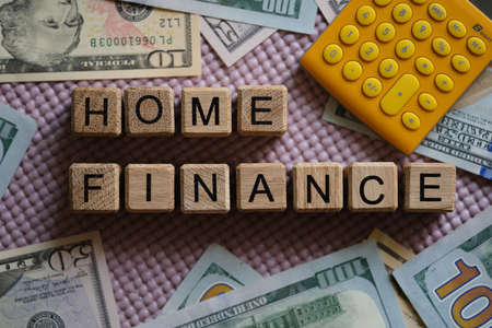 Home finance banknotes dollars and calculator closeupの写真素材