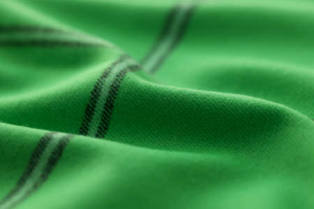 Green woolen fabric, textile cloth texture background