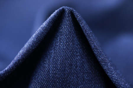 Dark blue grunge fabric texture for background, jeans cloth