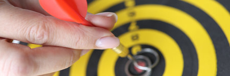 In center of darts are wedding rings with dartの写真素材