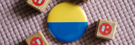 Ukrainian flag sign and cube with evil emoticons around