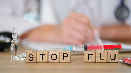 Stop flu word collected of wooden cubesの写真素材