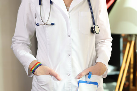 Cropped image of doctor with lgbt bracelet on her hand.の写真素材