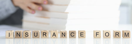 Insurance agent is looking for client insurance form closeupの写真素材