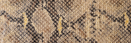 Smooth brown and black cotton fabric with stylish snake print