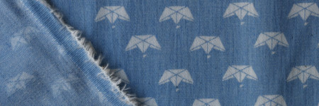 Face and back blue fabric with paper boat pictures.