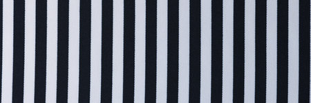Textile with different black and white stripes pattern as background.の写真素材
